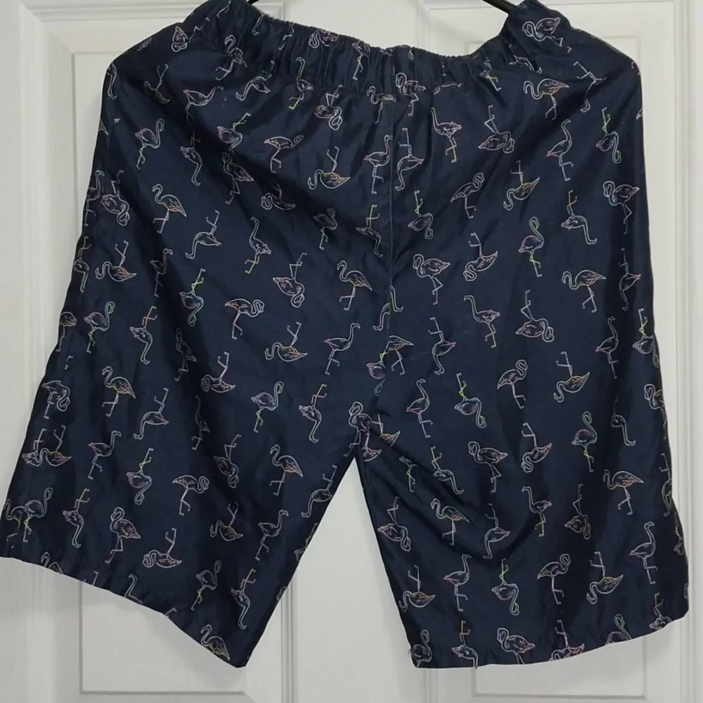 City Streets navy flamingo swim trunks, large 14/16